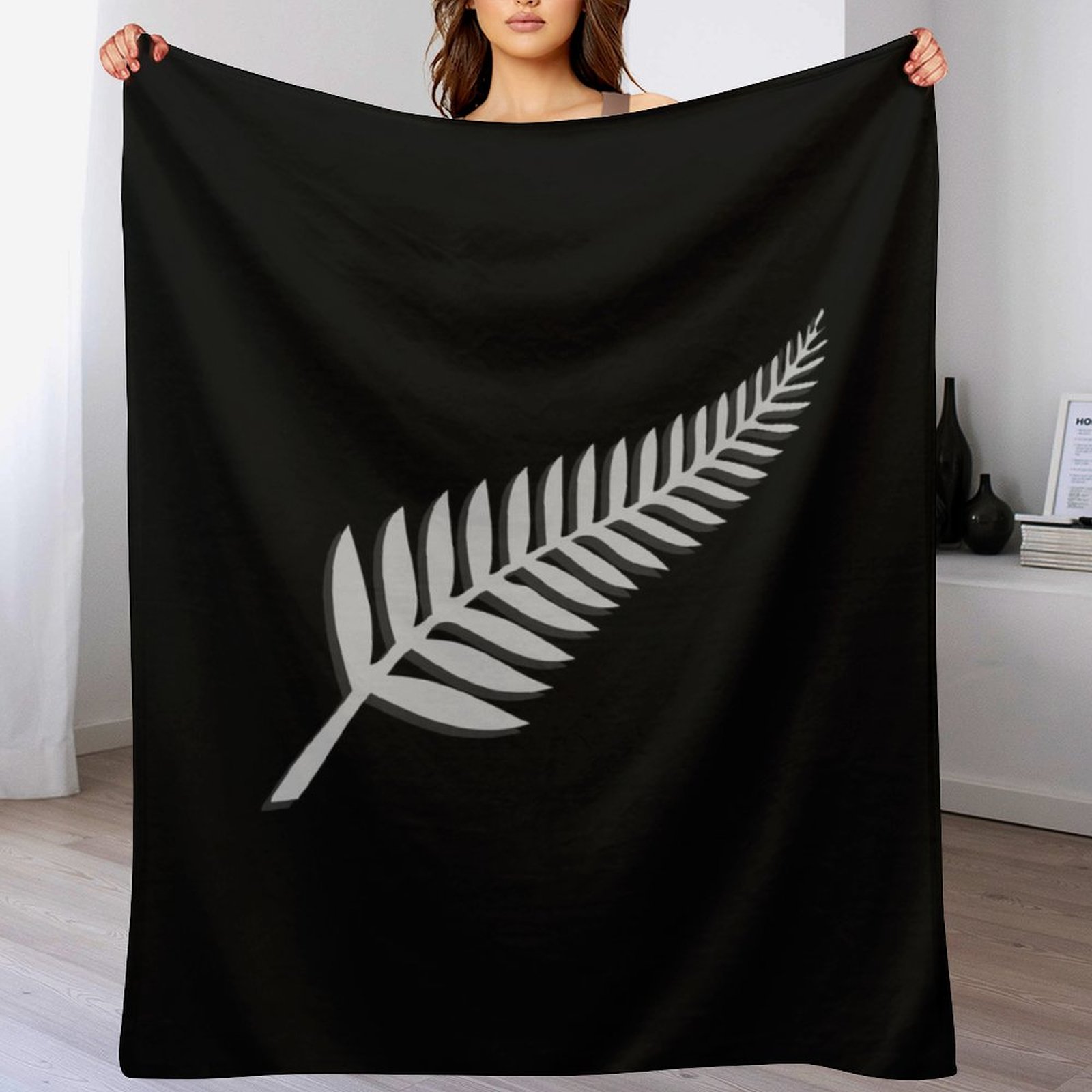 Manta deportiva con el emblema - Outdoor Sport Nz reseña y precio
